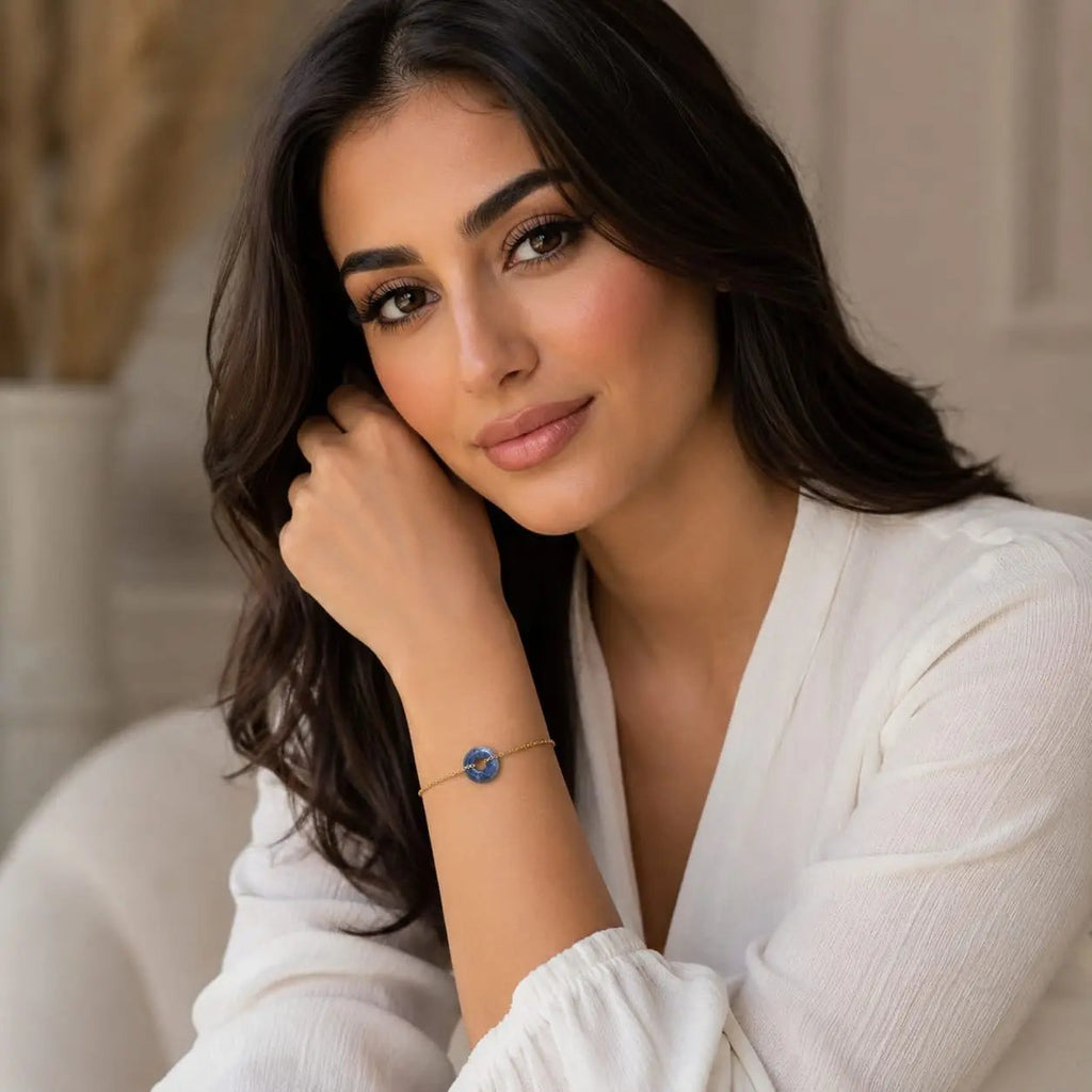 Model wearing a green gemstone donut bracelet by SAMVELLI