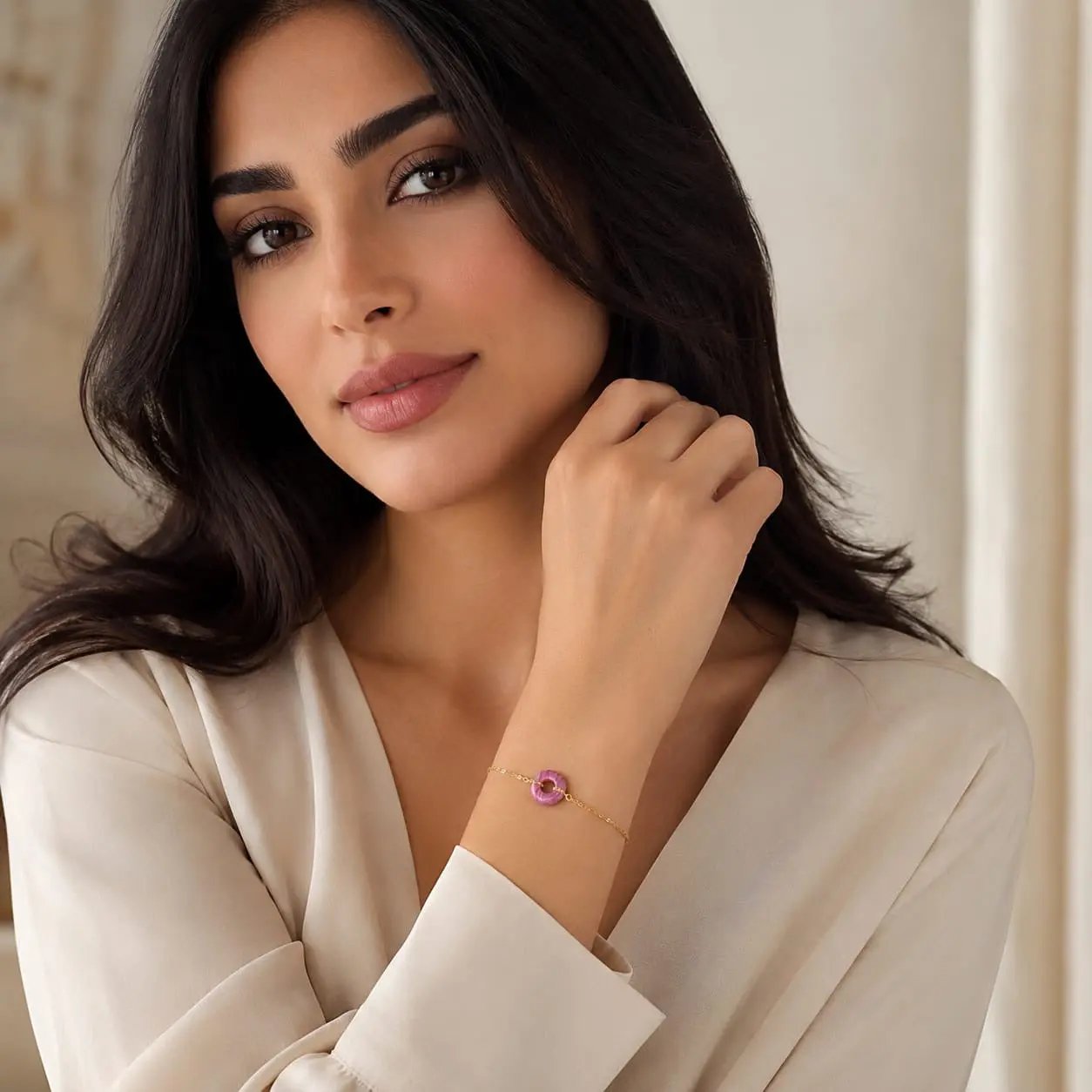 Model wearing a light purple agate donut bracelet