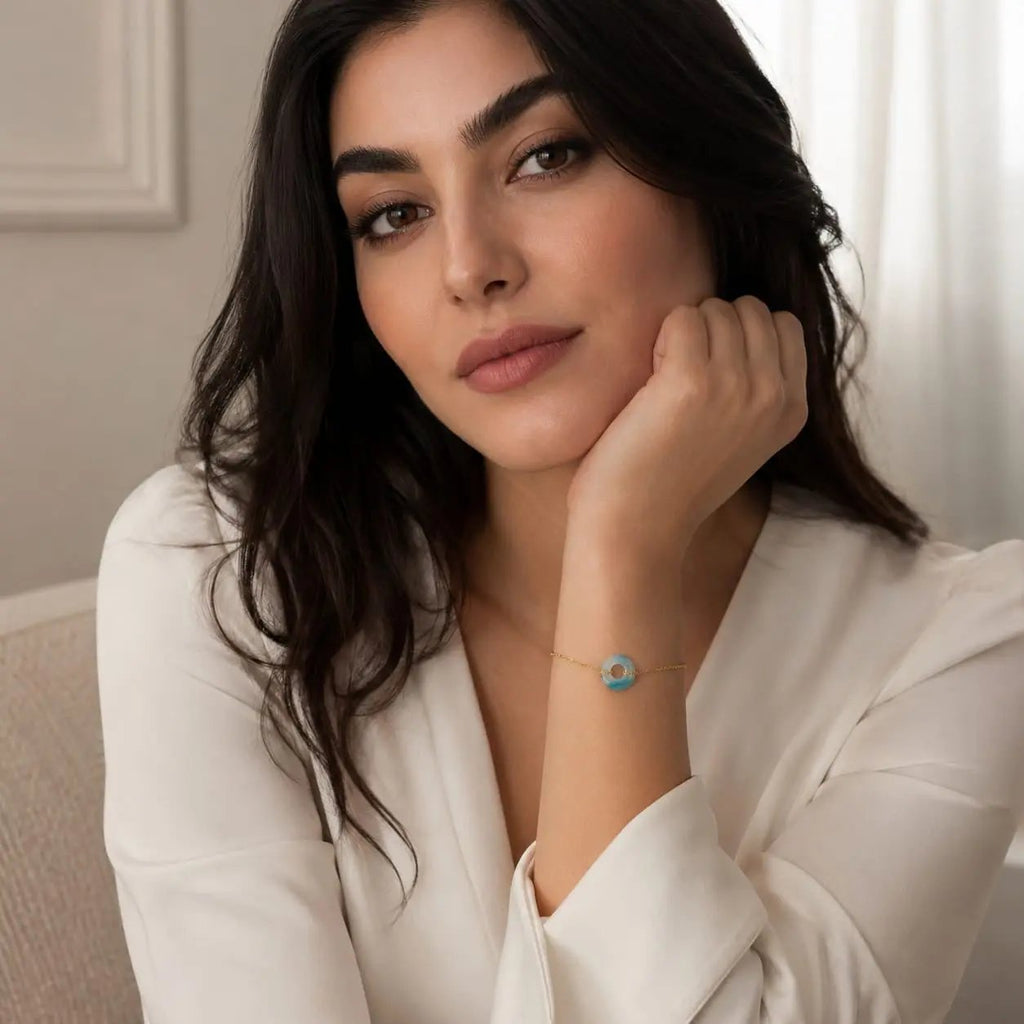Model wearing a light blue and white agate donut bracelet