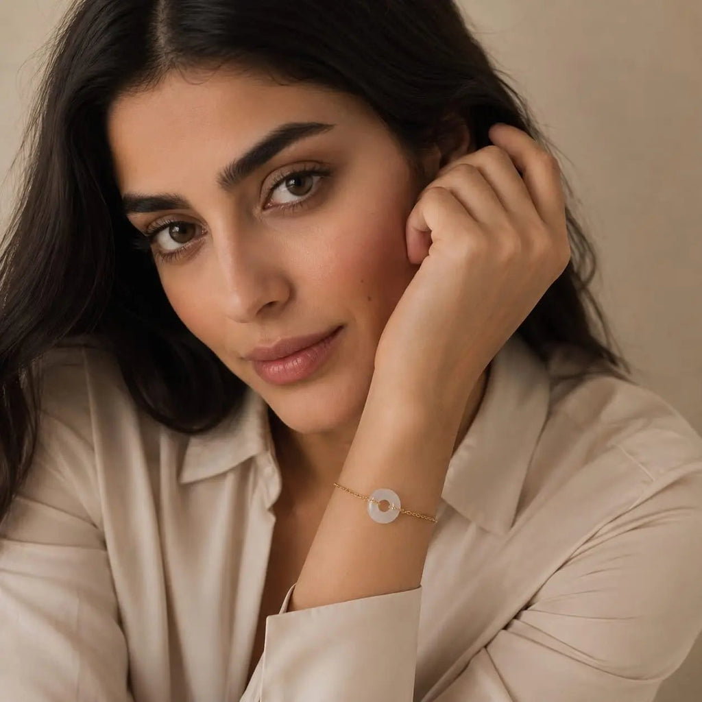 Model wearing a white crystal donut bracelet by SAMVELLI